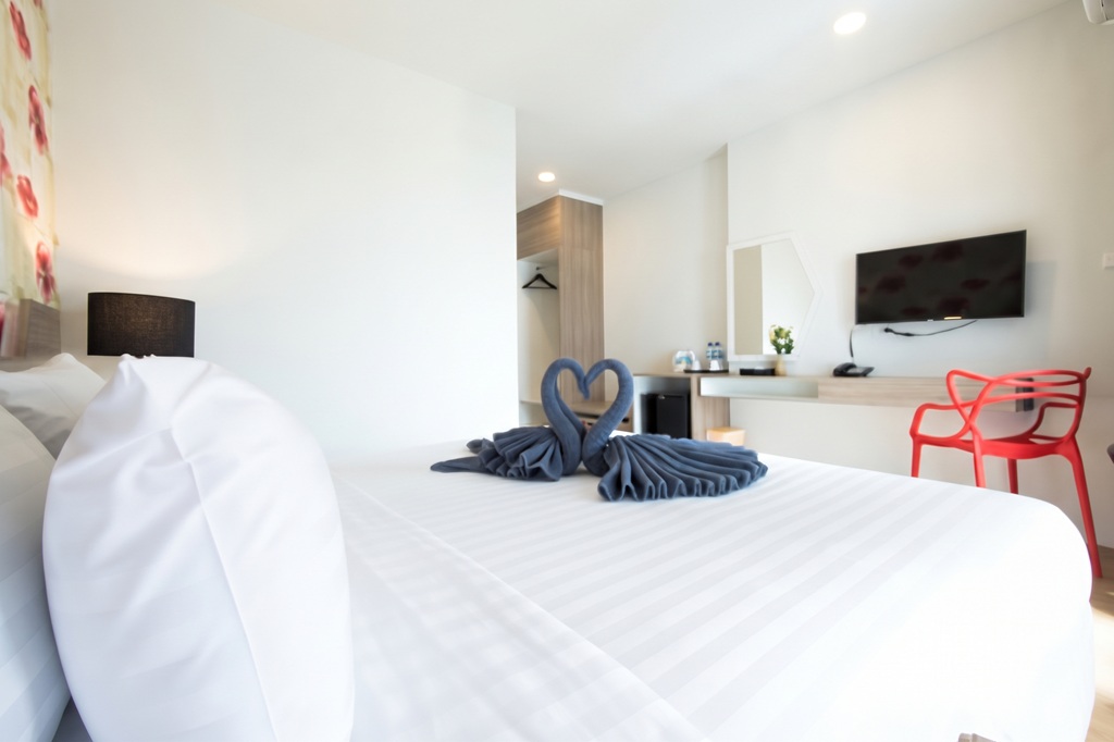 A photograph of a room in P Plus Hotel